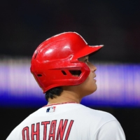 Los Angeles Angels designated hitter Shohei Ohtani reaches first on a single against the Texas Rangers on Friday at Angel Stadium. | USA TODAY / VIA REUTERS