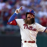 Phillies center fielder Brandon Marsh celebrates after hitting a double against the Atlanta Braves in the fourth inning of Game 4 of the NLDS at Citizens Bank Park, in Philadelphia, on Saturday. | USA TODAY / VIA REUTERS