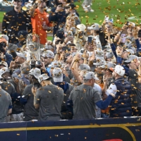 The Astros hoist the trophy after winning the World Series over the Phillies in Houston's Minute Maid Park on Saturday. | USA TODAY / VIA REUTERS