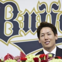 Masataka Yoshida speaks during a news conference at the Buffaloes' facility in Osaka on Thursday. | KYODO