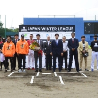 Players and officials line up at the opening of the amateur Japan Winter League in Ginowan, Okinawa Prefecture, on Nov. 26. | KYODO
