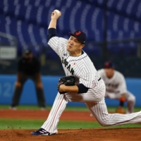 Masahiro Tanaka pitches for Japan at the Tokyo Olympics in August 2021. | REUTERS