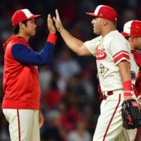Los Angeles Angels designated hitter Shohei Ohtani and center fielder Mike Trout celebrate a win over the New York Yankees at Angel Stadium on Aug. 31. | USA TODAY / VIA REUTERS