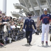 Samurai Japan pitcher Yu Darvish approaches the bullpen ahead of a training session in Miyazaki on Saturday. | KYODO