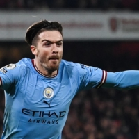 Manchester City's Jack Grealish celebrates after scoring against Arsenal during their Premier League match in London on Wednesday. | AFP-JIJI