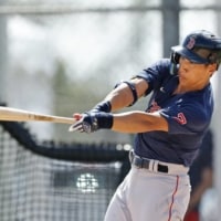 Red Sox outfielder Masataka Yoshida takes an at-bat during the first day of spring training in Fort Myers, Florida, on Monday. | KYODO