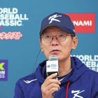 South Korea manager Lee Kang-chul speaks during a news conference ahead of his team's WBC opener at Tokyo Dome on Wednesday. | KYODO
