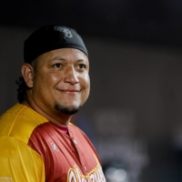 Miguel Cabrera has more hits, home runs and MVP award than any other player from Venezuela. | MAR 12, 2023; MIAMI, FLORIDA, USA; VENEZUELA DESIGNATED HITTER MIGUEL CABRERA (24) LOOKS ON FROM INSIDE THE DUGOUT IN THE SECOND INNING AGAINST PUERTO RICO AT LOANDEPOT PARK. MANDATORY CREDIT: SAM NAVARRO-USA TODAY SPORTS