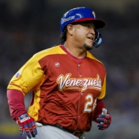 Venezuela designated hitter Miguel Cabrera runs to first after a single against Puerto Rico at LoanDepot Park in Miami on March 12 | USA TODAY / VIA REUTERS