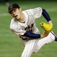 Japan starter Roki Sasaki pitches against the Czech Republic during their Pool B game in the World Baseball Classic at Tokyo Dome on Saturday. | REUTERS