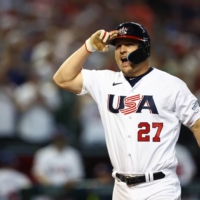 Mike Trout celebrates after hitting a three-run home run for the United States against Canada in their World Baseball Classic Pool C game in Phoenix on Monday. | USA TODAY / VIA REUTERS