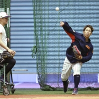 Masataka Yoshida practices in Osaka on Sunday. | KYODO