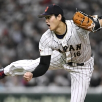 Japan's Shohei Ohtani pitches against China during the World Baseball Classic at Tokyo Dome on Thursday. | KYODO
