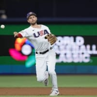 U.S. shortstop Trea Turner throws to first for an out against Cuba during the first inning at LoanDepot Park in Miami. The U.S. won the World Baseball Classic semifinal 14-2. | USA TODAY / VIA REUTERS