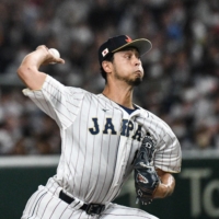 Yu Darvish pitches during the World Baseball Classic game between Japan and Italy at the Tokyo Dome on March 16. | AFP-JIJI