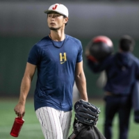 Yu Darvish attends a training session ahead of the World Baseball Classic at Tokyo Dome on March 8. | AFP-JIJI