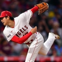 Los Angeles Angels starting pitcher Shohei Ohtani throws in the fifth inning of the team's win over the Kansas City Royals on Friday at Angel Stadium. | USA TODAY / VIA REUTERS
