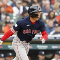Masataka Yoshida hits a double to right against the Tigers during the ninth inning in Detroit on Thursday. | USA TODAY / VIA REUTERS