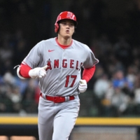 Angels designated hitter Shohei Ohtani rounds the bases after hitting his seventh home run of the season on Sunday in Milwaukee, Wisconsin. | USA TODAY / VIA REUTERS