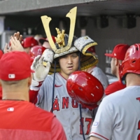 Shohei Ohtani recorded his fourth career home run as a winning pitcher against the Orioles in Baltimore, Maryland, on Monday. | AP / VIA KYODO