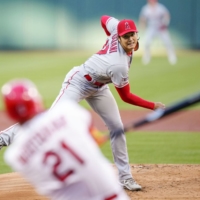 Angels starter Shohei Ohtani strikes out the Cardinals' Lars Nootbar during their game in St. Louis on Wednesday. | KYODO