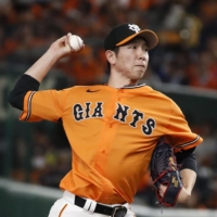 The Giants' Shosei Togo threw a shutout against the BayStars to earn his fifth win of the season at Tokyo Dome on Wednesday. | KYODO
