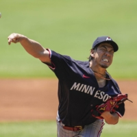 The Twins' Kenta Maeda pitches against the Braves during the first inning at Truist Park in Atlanta on Wednesday. | USA TODAY / VIA REUTERS