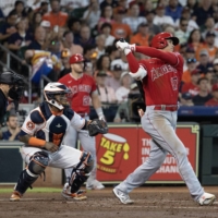 Los Angeles Angels designated hitter Shohei Ohtani hits an RBI triple against the Houston Astros on Saturday at Minute Maid Park. | USA TODAY / VIA REUTERS