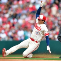 The Angels' Shohei Ohtani slides into second during the fourth inning against the Mariners in Anaheim, California, on Sunday. | USA TODAY / VIA REUTERS