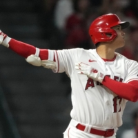 Los Angeles Angels starting pitcher Shohei Ohtani hits a home run in the seventh inning against the Chicago White Sox on Tuesday | USA TODAY / VIA REUTERS