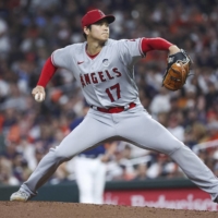Los Angeles Angels starting pitcher Shohei Ohtani throws during the fifth inning against the Houston Astros on Friday. | USA TODAY / VIA REUTERS