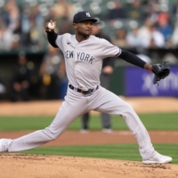 Yankees starter Domingo German pitches against the A's during the first inning at Oakland Coliseum in Oakland, California, on Wednesday. | USA TODAY / VIA REUTERS