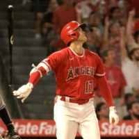 Shohei Ohtani flips his bat after hitting his 35th home run of the season against the Yankees in Anaheim, California, on Monday. | USA TODAY / VIA REUTERS